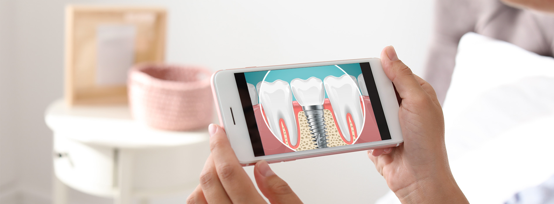 A person holding a smartphone displaying an advertisement with images of toothpaste and a toothbrush.